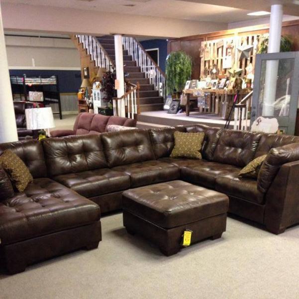 Transform your living room with this gorgeous sectional and ottoman. 