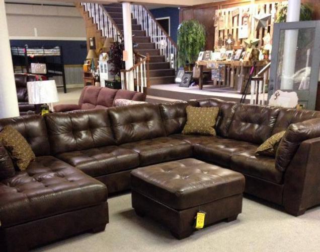 Transform your living room with this gorgeous sectional and ottoman. 